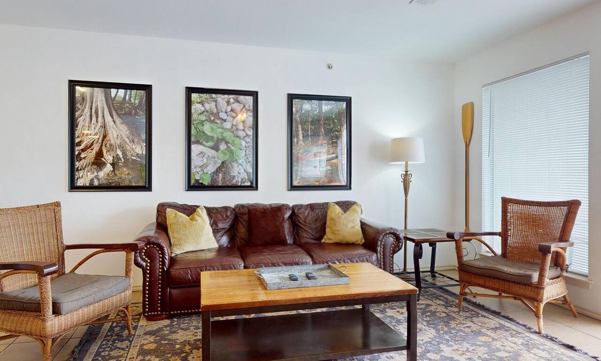 New Braunfels Condo | River City Resorts: WW J203 *Guadalupe River, Free Tubes with Rental*