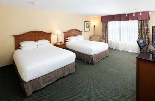 Downtown Hotel | 4 Spacious Rooms w/2 Queen Beds , Pool, & Convenient Parking Near the Coast