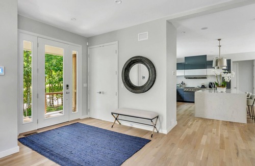 North Sea House | Designer Gut Renovated Farmhouse on over 1 Acre, Numerous Spacious Living.