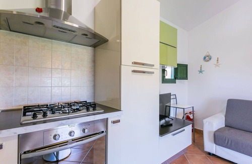 Castellina Marittima Apartment | Lovely apartment for 2 guests with pool, A/C, WIFI, TV, balcony and pets allowed