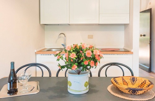 Marina di Bibbona Apartment | Lovely apartment for 4 guests with A/C, pool, WIFI, TV and patio