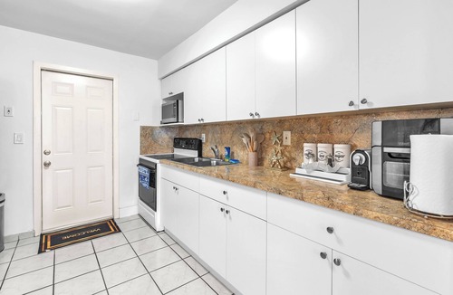 West Little Havana Apartment | Miami Oasis Canal View Backyard Lounge 6 min Airport Near World Cup 2026 Stadium