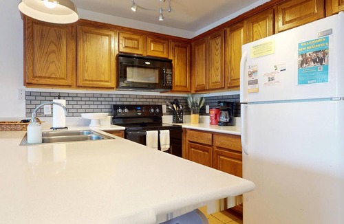 New Braunfels Condo | River City Resorts: WW J203 *Guadalupe River, Free Tubes with Rental*