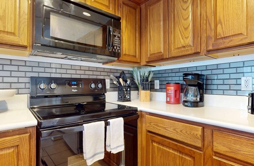 New Braunfels Condo | River City Resorts: WW J203 *Guadalupe River, Free Tubes with Rental*