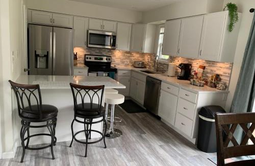 Elizabethtown House | School Village Walk-in shower and jetted tub