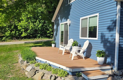 Alden House | Spacious home near Torch Lake w/custom back patio, steps away from public access