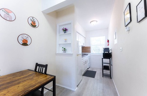 East Little Havana Apartment | Stay in this bright and modern 1BR in Little Havana, featuring stylish décor, a cozy living room, and a welcoming dining area. Walk to Calle Ocho cafés, murals, and music, and reach Brickell in minutes. Perfect Miami base for couples or solo traveler