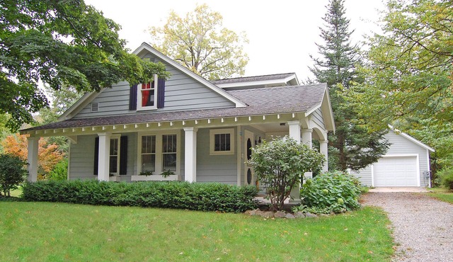 Charming home near Glen Arbor with a porch, gas grill, lake views, & AC