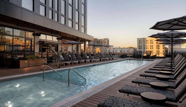 Intimate and Eclectic Escape In The Heart of Nashville | King Bed. Rooftop Pool