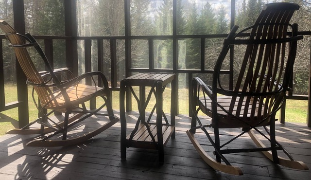 Secluded acre with lots of outdoor living spaces. 2 minutes to premiere hiking.