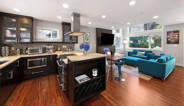 Stylish Queen Anne townhouse with rooftop deck, secure parking, walk score 94!